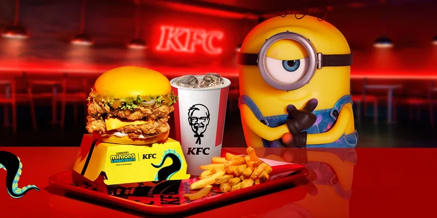 Міньйон біля бургера KFC з жовтою булкою та банановим акцентом